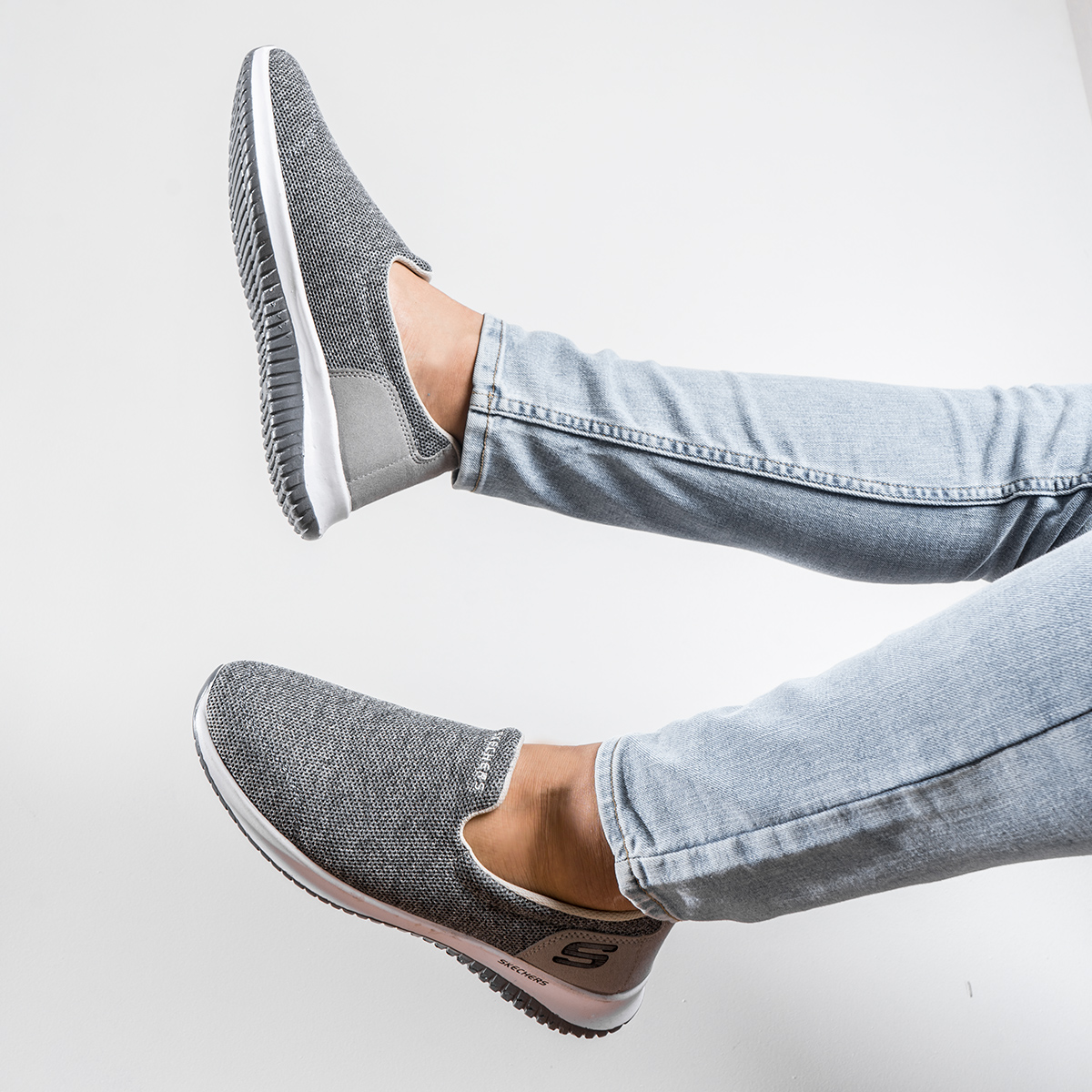 کفش ورزشی اسکیچرز مردانه طوسی مدل Tarok