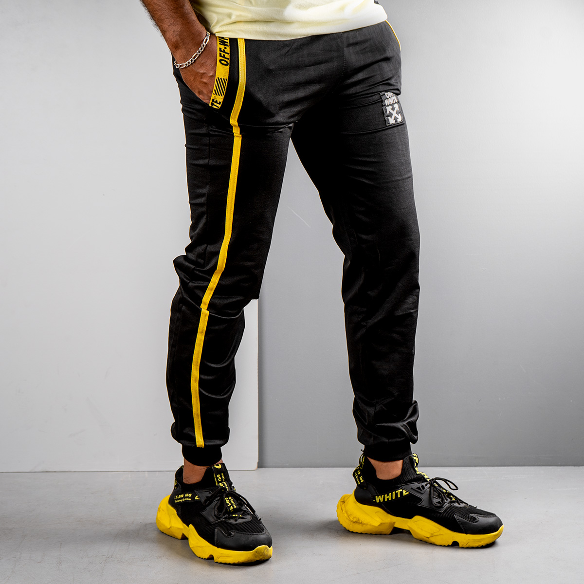 شلوار اسلش مردانه مشکی زرد مدل P62(T)