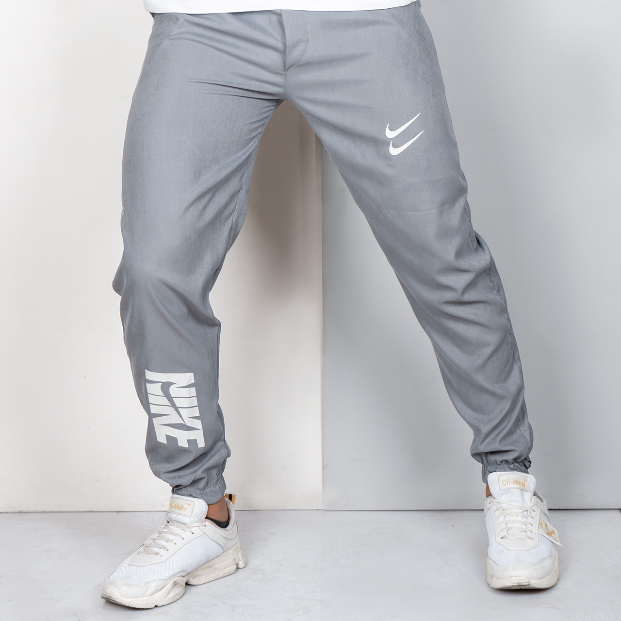 شلوار اسلش Nike مردانه طوسی مدلTava