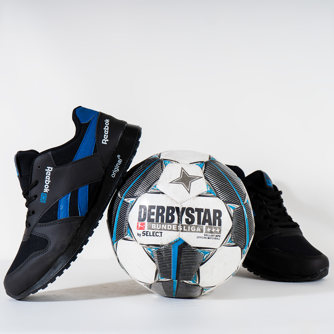 کفش ورزشی Reebok مشکی آبی مردانه مدلRako