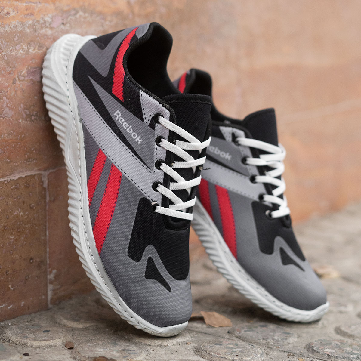 کفش ورزشی (T) ریبوک طوسی مردانه مدل adena