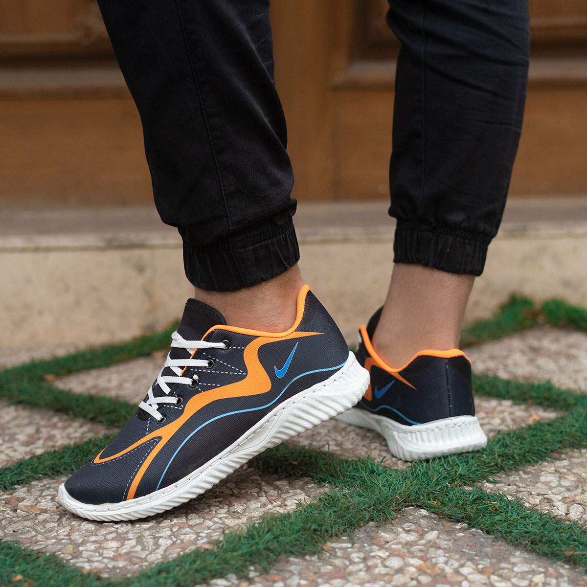 کفش ورزشی (T) مردانه مشکی نارنجی مدل jimin