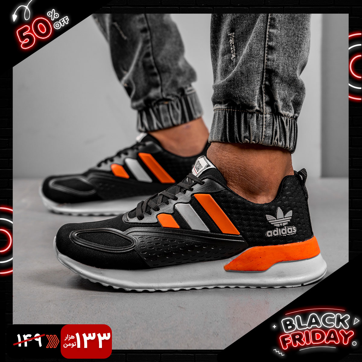 کفش ورزشی Adidas مردانه مشکی نارنجی مدل Tilda